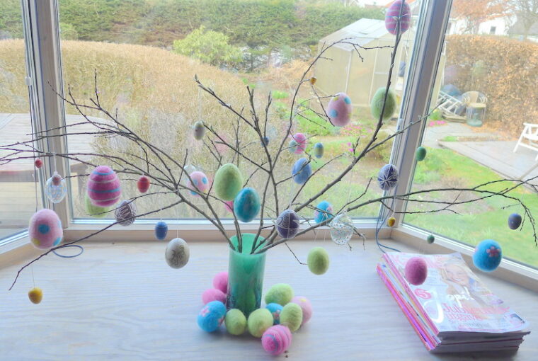 branches with colorful eastereggs hanging on it