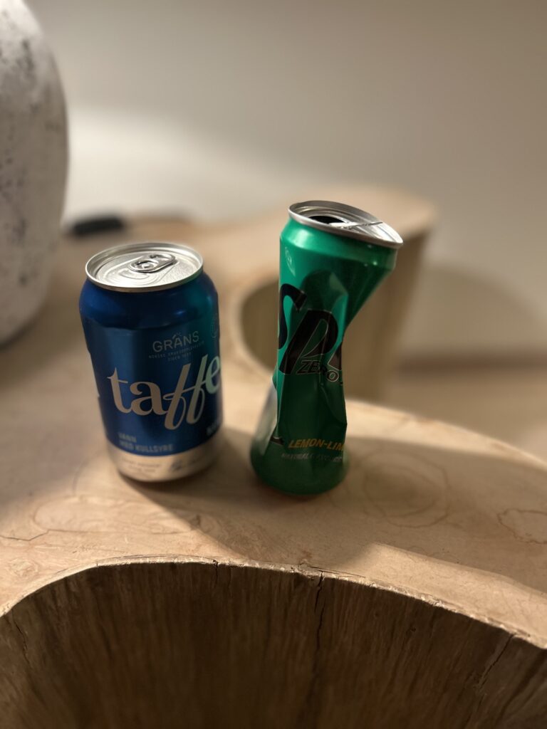 one full soda can and one empty one